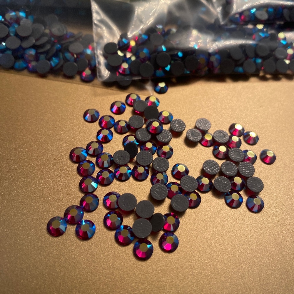 Swarovski • Color: Fuchsia AB, 2028 XILION Rose Hotfix Rhinestones